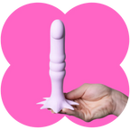A pale pink silicone dildowith a flared base, held in a hand against a bright pink graphic background.