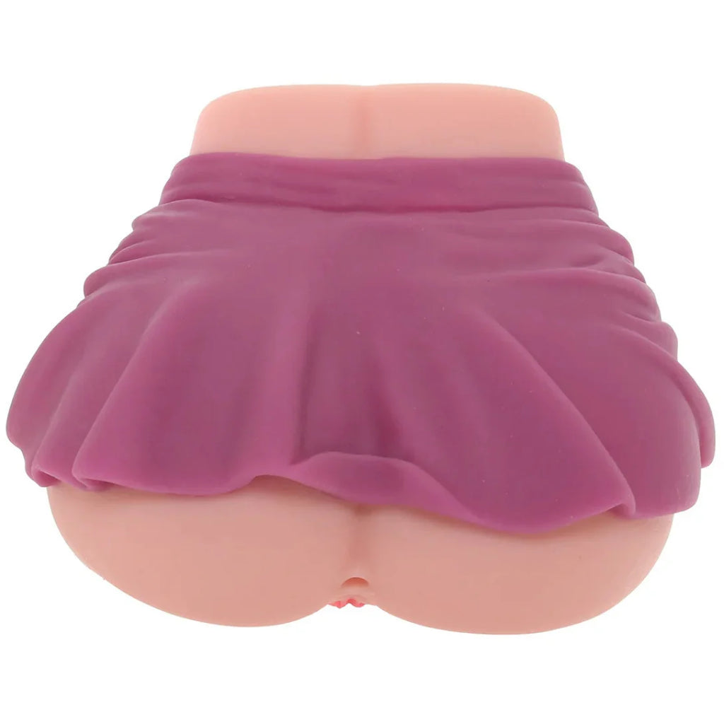 Silicone model adult toy of a female torso with a purple skirt on a white background