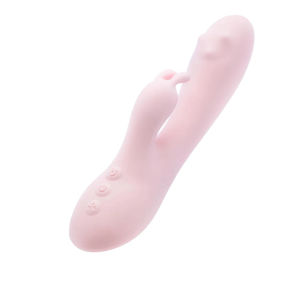 A light pink silicone personal massager with a curved shaft, a separate suction-style nozzle, and three small control buttons on the base, shown against a plain white background.